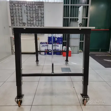 Banco de apoyo plegable para chasis de karts